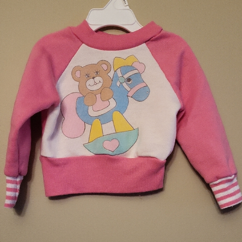 Vintage pink/white sweatshirt with bear and rocking horse design